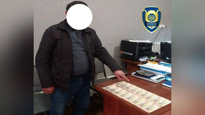 'Farg`onada ichimlik suvi iste`molidan qarzdorlikni yo`q qilib berishni va`da qilgan muhandis ushlandi'ning rasmi