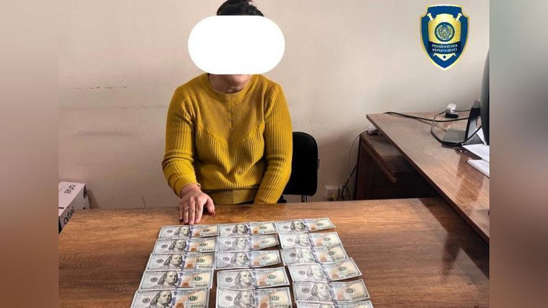 'Qoraqalpog`istonda “prava” olib berish uchun uch kishidan 2,1 ming dollar talab qilgan ayol ushlandi'ning rasmi