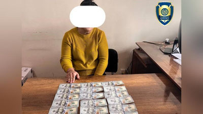'Qoraqalpog`istonda “prava” olib berish uchun uch kishidan 2,1 ming dollar talab qilgan ayol ushlandi'ning rasmi
