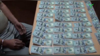 'Navbahor tuman hokimi o`rinbosari 4 000 AQSh dollari pora olayotgan vaqtida qo`lga olindi (video)'ning rasmi