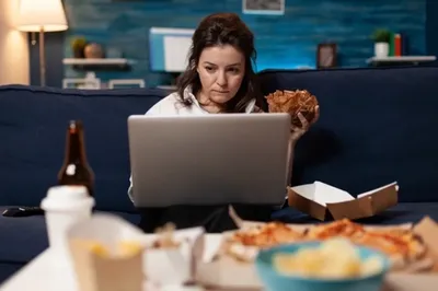 Image of 'What is the reason for eating a lot of food related to?'
