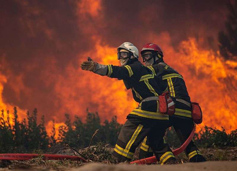 Image of 'Strong forest fires have erupted in Spain.'