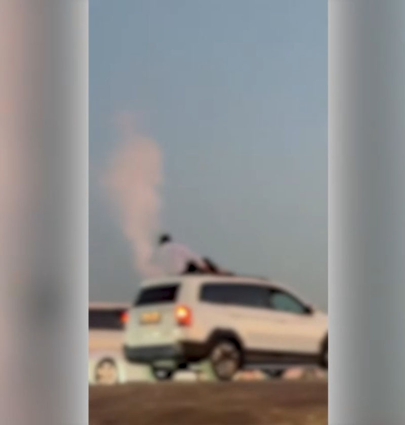 Image of 'In Tashkent region, a young man fired a salute from a car roof.'