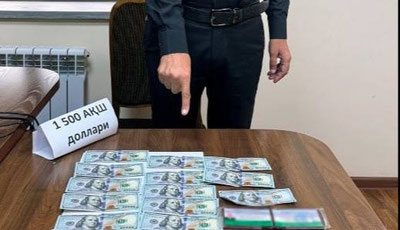 Image of 'The legal counsel of the Tashkent region administration was caught taking a bribe.'