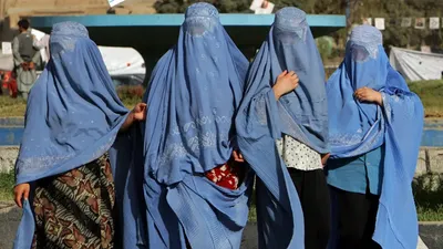 Image of 'Women with uncovered faces have been banned from entering shops in Afghanistan.'