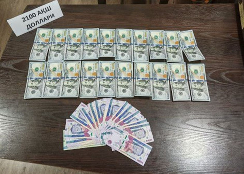 Изрображение 'В Сурхандарье задержали сотрудника банка при получении 2-х тысяч долларов'