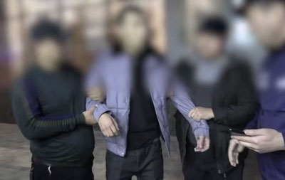 Изрображение 'В Андижане сотрудник ОВД и менеджер университета задержаны при получении взятки'