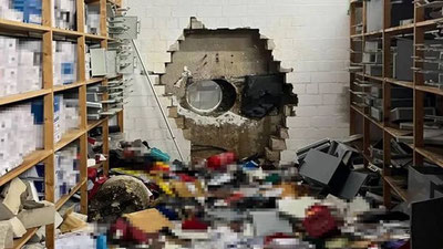 Image of 'They broke into the bank with a large drill.'