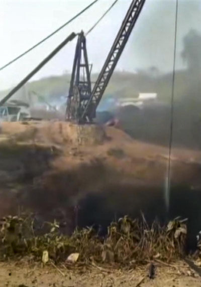 Image of 'At least 18 people were killed in a blast at a coal mine in India.'