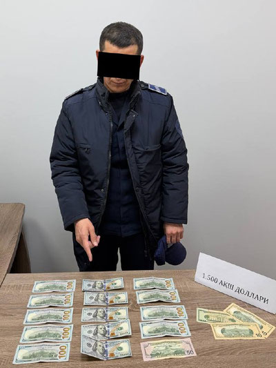 Изрображение 'В Ташкенте при получении $1500 задержан инспектор отдела по ЧС'