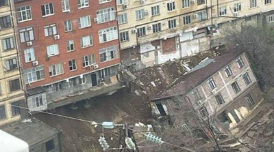 Image of 'Heavy rain destroyed buildings in Makhachkala.'